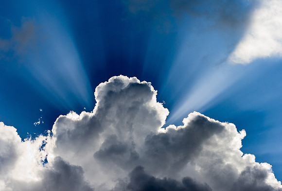 God rays behind clouds