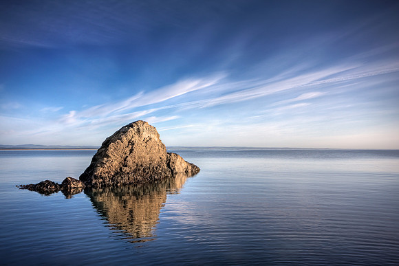 Fife Coastal Trail - a lone rock in the North Sea at sunrise