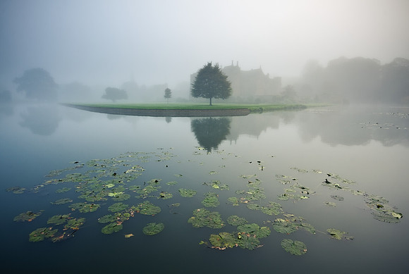 Broughton Castle on a misty morning